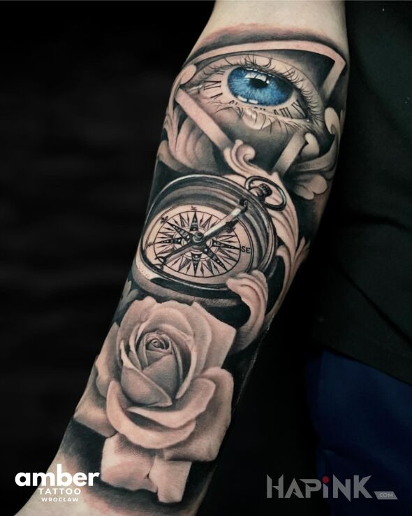 Tattoo Realistyczna róża, kompas, oko abstrakcji in flowers motif and realistic style On the arm