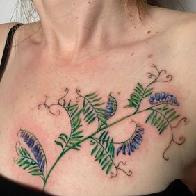 Tattoo Colorful Floristry on the breast motif: colorful style: realistic