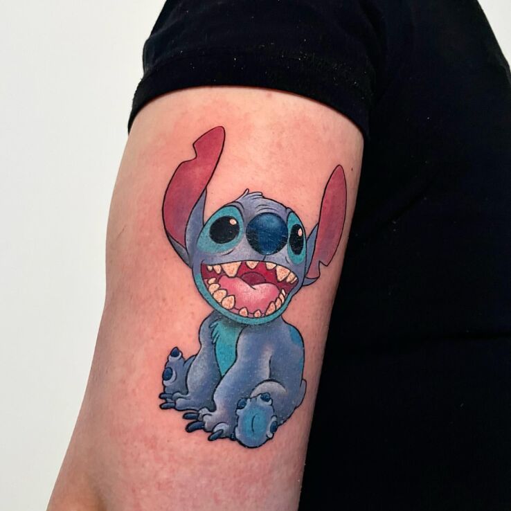 Tattoo Stitch in characters motif and cartoon / comic book style on the upper arm