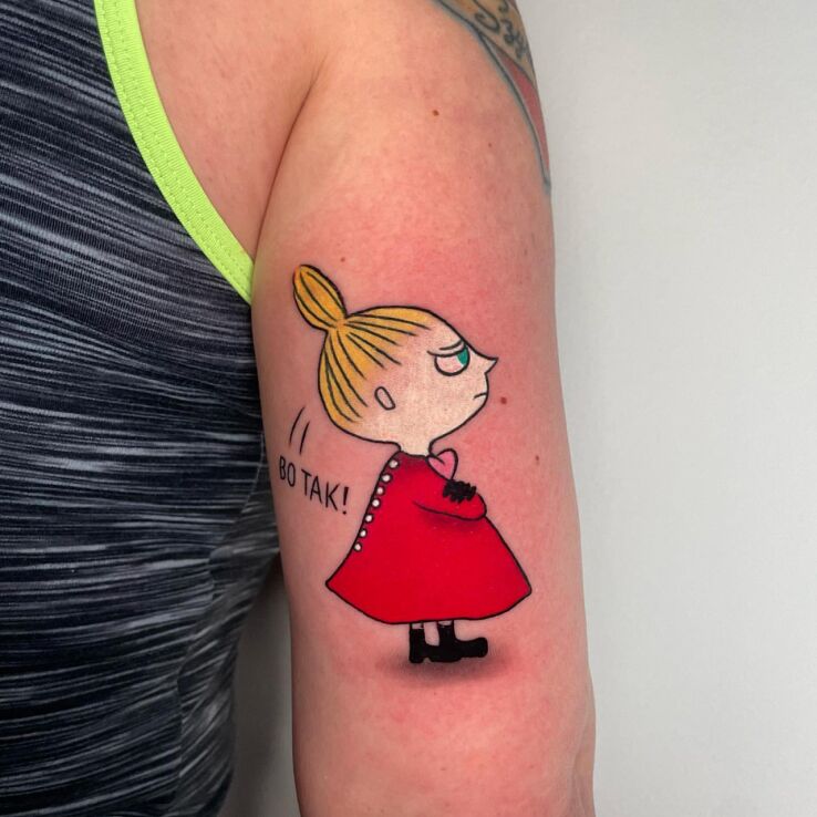 Tattoo Helga in characters motif and cartoon / comic book style On the arm