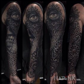 Tattoo Eye hidden in geometry on the bicep motif: black and gray style: geometric