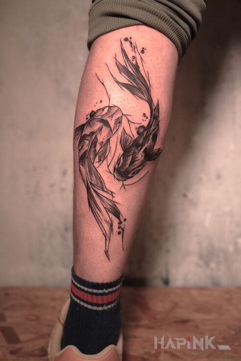 Tattoo Rybki! in black and gray motif and sketch style on the leg