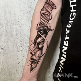 Tattoo Facial dagger on the shoulder blades motif: objects style: graphic / illustrative