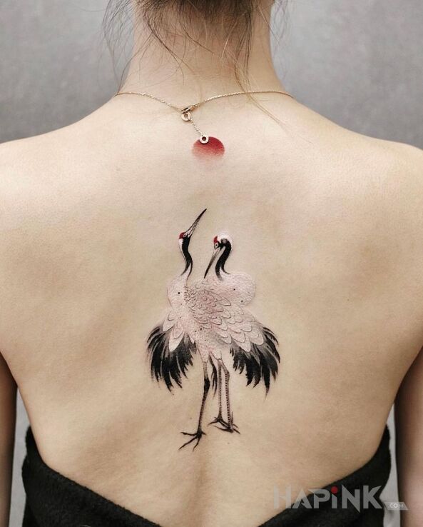 Tattoo Dwie białe czaple in colorful motif and graphic / illustrative style on the back