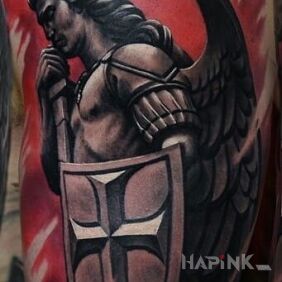 Tattoo Archangel on the upper arm motif: characters