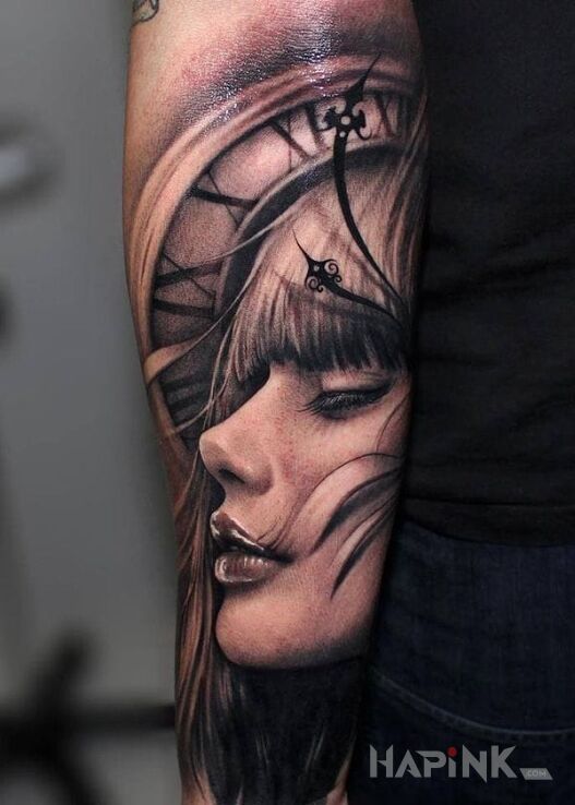 Tattoo Dziewczyna i zegar in faces motif and realistic style on the forearm