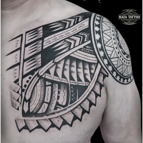Tattoo Polynesian tattoo on the shoulder motif: black and gray style: Polynesian