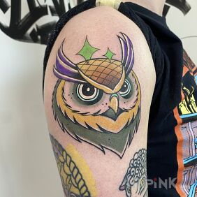 Tattoo Owl new school On the arm motif: colorful style: newschool