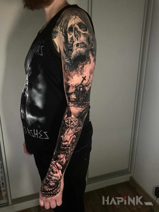 Tattoo Demoniczny rękaw w szarościach in religious motif and realistic style on the forearm