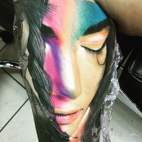Tattoo Colorful doll on the calf motif: 3D style: realistic
