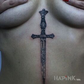 Tattoo Dagger on the stomach motif: objects