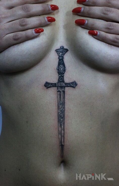 Tattoo Sztylet in sexy motif on the stomach