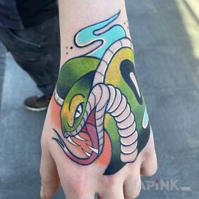Tattoo Snake On the arm motif: colorful style: newschool