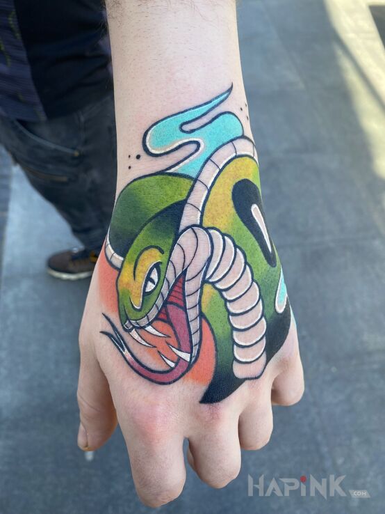 Tattoo Wąż in animals motif and newschool style On the arm