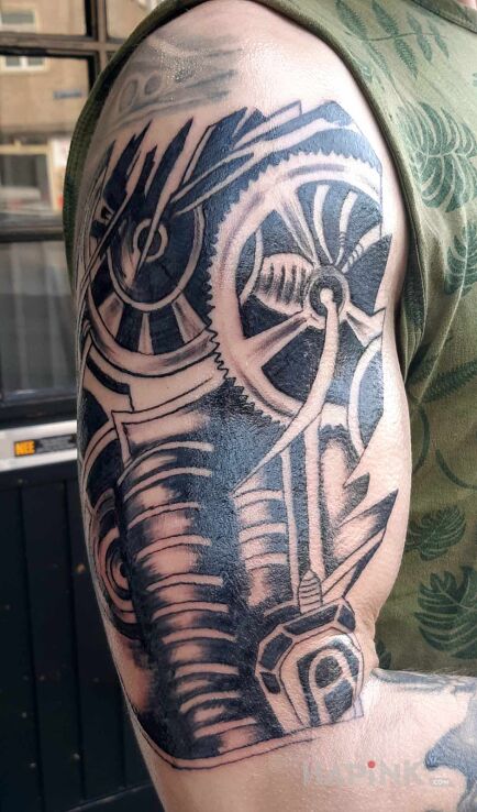 Tattoo Początek rekawa in other motif and biomechanics style on the upper arm