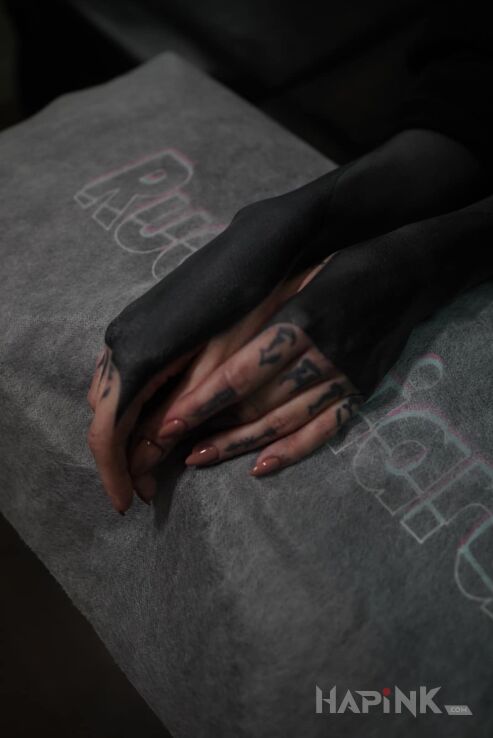 Tattoo Blackwork na dłoniach. in other motif and blackwork / blackout style On the arm