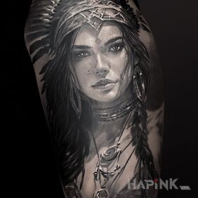 Tattoo Portrait of a Native American woman. on the upper arm motif: black and gray style: realistic