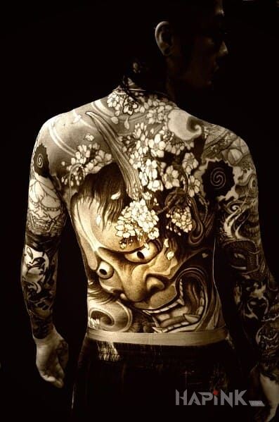 Tattoo Maska in demons motif and japanese / irezumi style on the upper arm