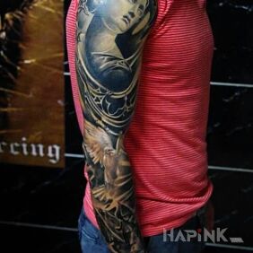 Tattoo Sculpture on the upper arm motif: sleeves