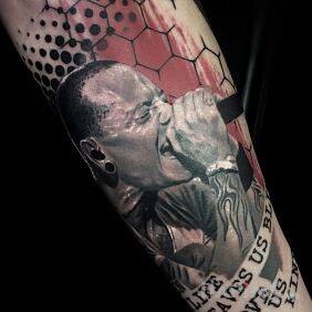 Tattoo Chester Bennington / Linkin Park On the arm motif: black and gray style: trash polka