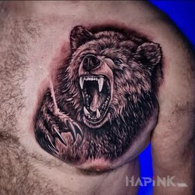 Tattoo Bear on the chest on the chest motif: black and gray style: realistic
