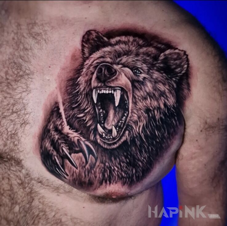 Tattoo Niedwiedz na kłatce piersiowej in black and gray motif and realistic style on the chest