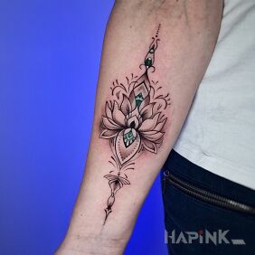 Tattoo Mandala flower on the forearm on the forearm motif: flowers style: graphic / illustrative