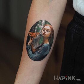 Tattoo Vixen on the forearm motif: characters style: realistic
