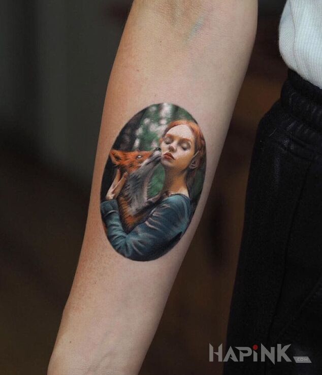 Tattoo Lisica in characters motif and realistic style on the forearm