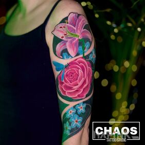 Tattoo Colorful flowers On the arm motif: flowers style: realistic