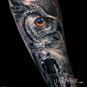 Tattoo Family theme owl On the arm motif: black and gray style: realistic