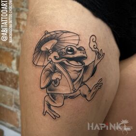 Tattoo Frog in a kimono on the leg motif: black and gray style: graphic / illustrative