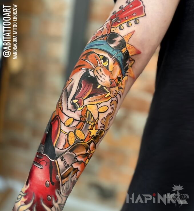 Tattoo Rock 'n rollowy kocur in animals motif and neo-traditional style On the arm