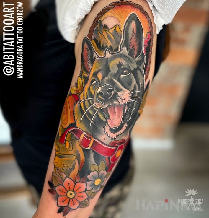 Tattoo Portret psiaka in flowers motif and neo-traditional style On the arm