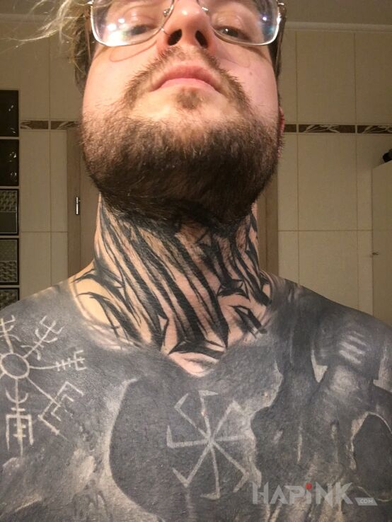 Tattoo Blackwork in black and gray motif and blackwork / blackout style on the chest