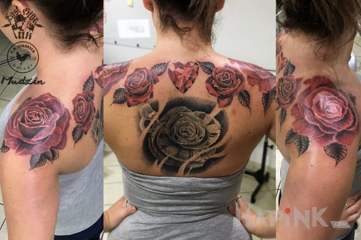 Tattoo Róże kwiaty in flowers motif on the back