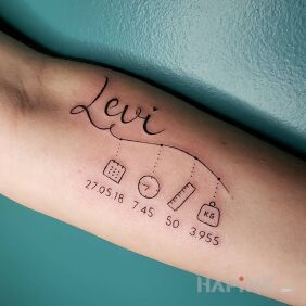 Tattoo Levi On the arm motif: lettering style: calligraphy