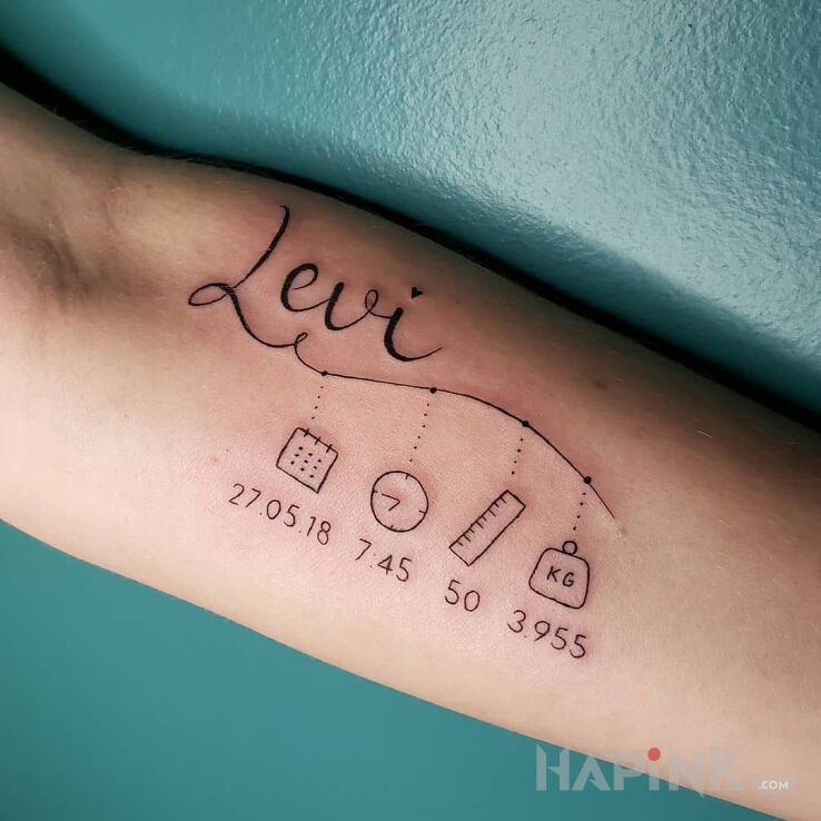 Tattoo Levi in lettering motif and calligraphy style On the arm