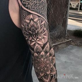 Tattoo Geometric paradise on the upper arm motif: mandalas style: geometric