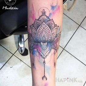 Tattoo Mandala watercolor on the forearm motif: flowers style: Watercolor