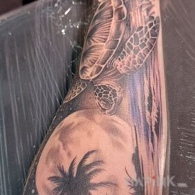Tattoo Sea turtle, ocean, palm trees, beach on the forearm motif: animals style: realistic