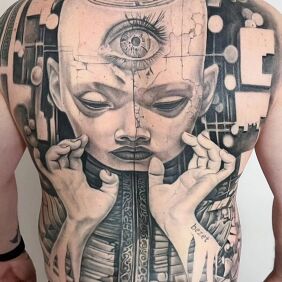 Tattoo The world in your hands on the shoulder blades motif: black and gray style: surrealistic