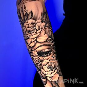 Tattoo Flowers and eye on the forearm on the forearm motif: flowers style: realistic