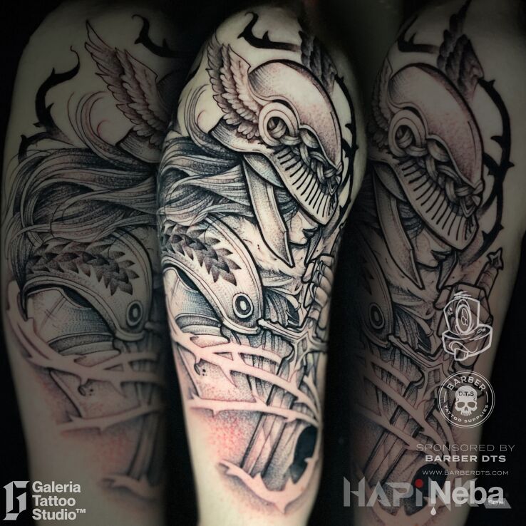 Tattoo Malenia Elden Ring in black and gray motif and graphic / illustrative style On the arm