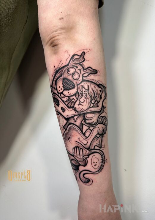 Tattoo Scooby Doo in funny motif and graphic / illustrative style On the arm