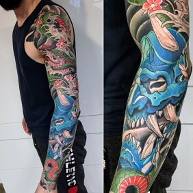 Tatuaż Rękaw irezumi na ramieniu motyw: kwiaty styl: japońskie / irezumi