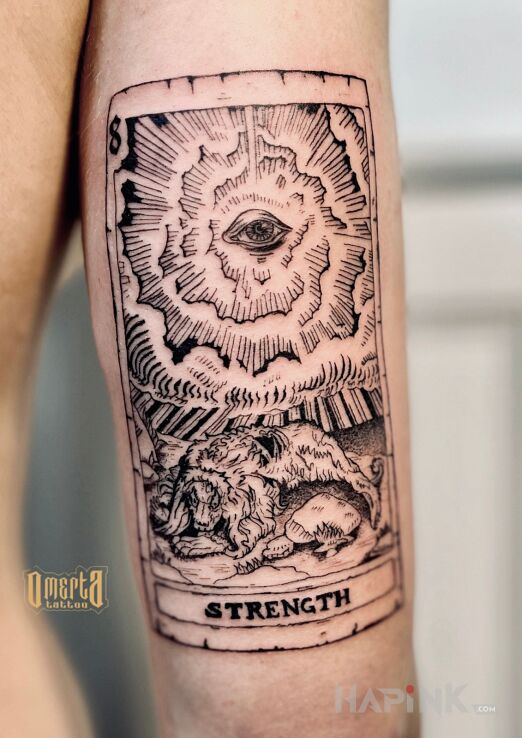 Tattoo Karta tarota in black and gray motif and engravings / gravure style on the upper arm
