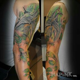 Tattoo Bat in Ivy on the upper arm motif: 3D style: realistic