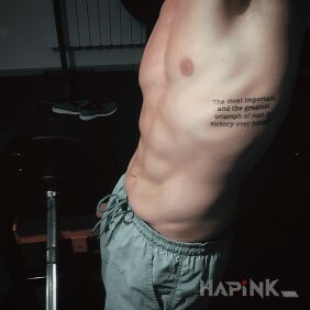 Tattoo Quote on the ribs motif: lettering style: calligraphy