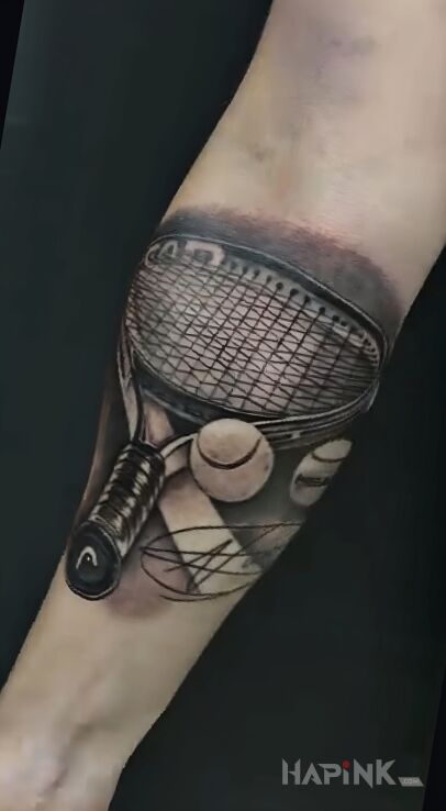 Tattoo Rakieta tenisowa in objects motif and realistic style on the forearm